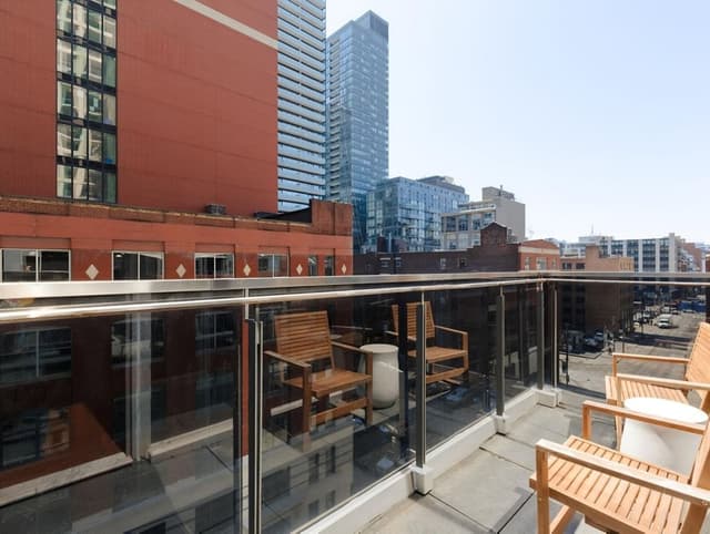 State-of-the-art fitness center with modern exercise equipment at Nester Entertainment District in Entertainment District, Toronto