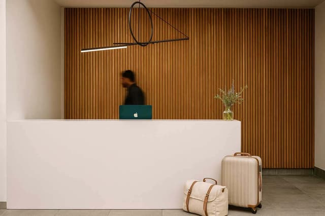 Modern lobby seating area at Nester Downtown Montréal with contemporary furniture and design