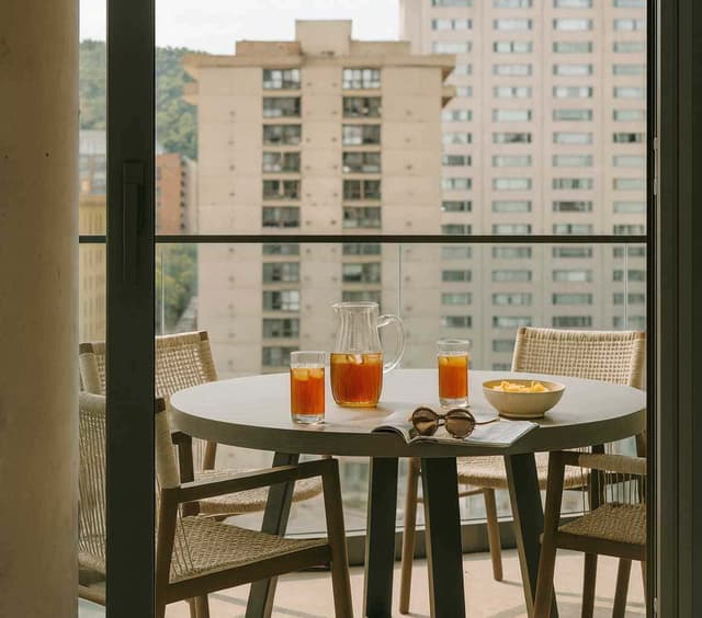 State-of-the-art fitness center at Nester Downtown Montréal with modern exercise equipment and city views